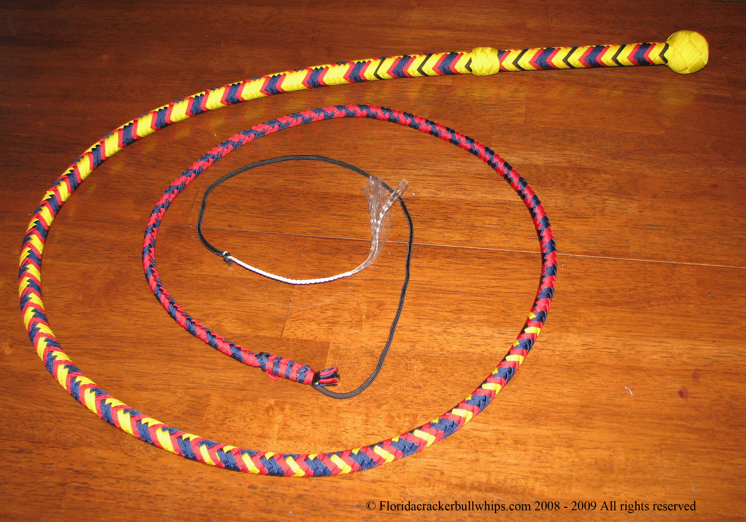 16 Plait nylon bullwhip in V-pattern colors imperial red, blue and yellow.